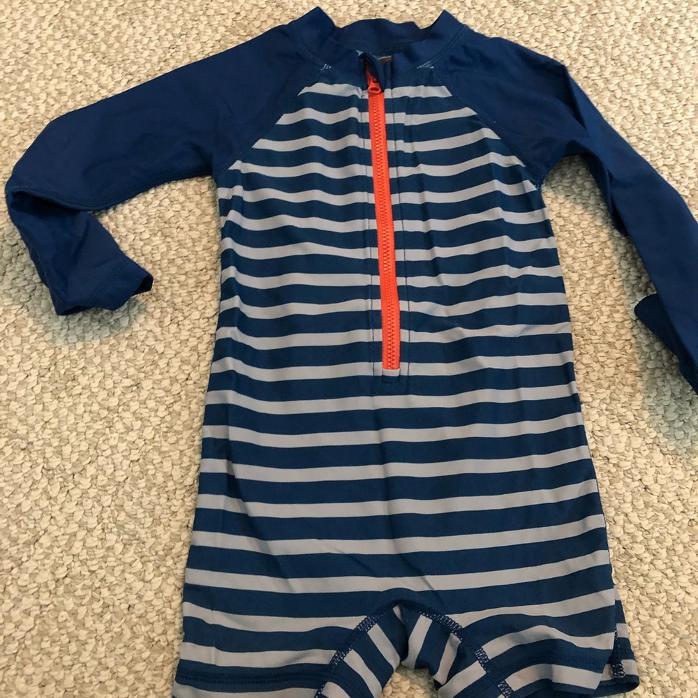 Tea brand size 12-18months swimsuit. Super cute on!
